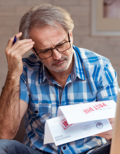 unhappy man get negative response from past due bill